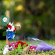 A cross with flowers sits near the intersection of Satilla Rd. and Holmes Rd. in the Satilla Shores neighborhood where Ahmaud Arbery was shot and killed May 7, 2020 in Brunswick, Georgia. Arbery was shot during a confrontation with an armed father and son on Feb. 23.